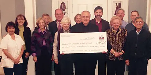 St. Joseph Church campaign check presentation.