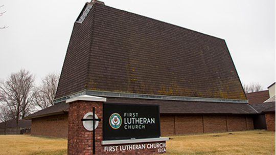 Exterior and sign of First Lutheran Church Lincoln, NE.