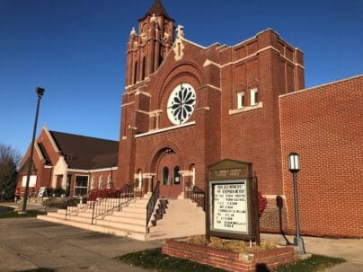 Front entrance of St Thomas Aquinas Church & School, Webster City, IA, led by Walsh & Associates, Church Capital Campaign Specialists, successful capital campaign.